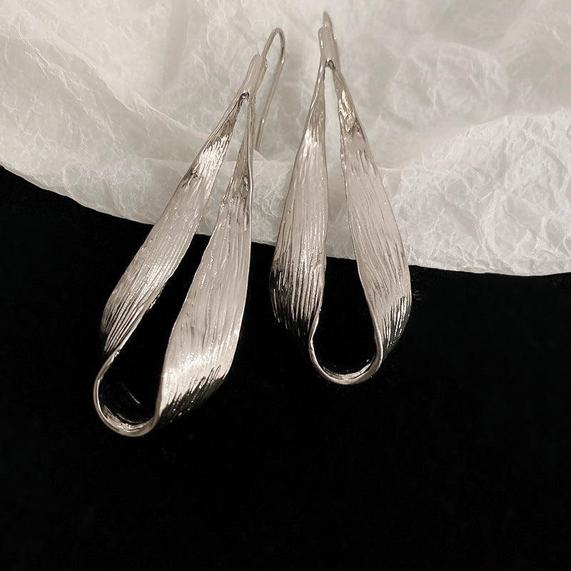 ZAMA DUMA cold metal feeling water drop leaf ear hook earrings European and American exaggerated niche temperament high sense Internet celebrity earrings women