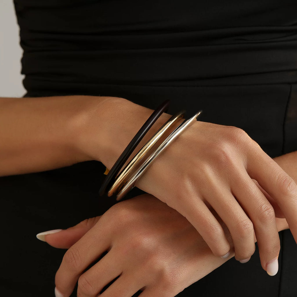 Retro multi strand snake chain layered stacked mixed metal bracelet fluid sculptural wind-inspired fluid organic bracelet anti-tarnish hypoallergenic effortless chic everyday style