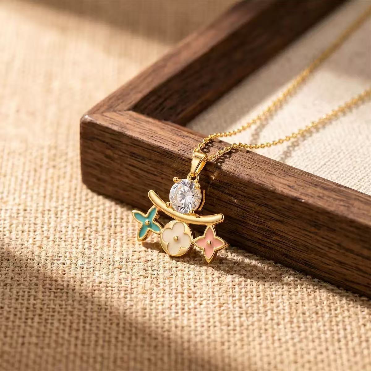 ZAMA DUMA light luxury presbyopia titanium steel necklace color drop glaze popcorn shape three-dimensional inlay advanced wholesale