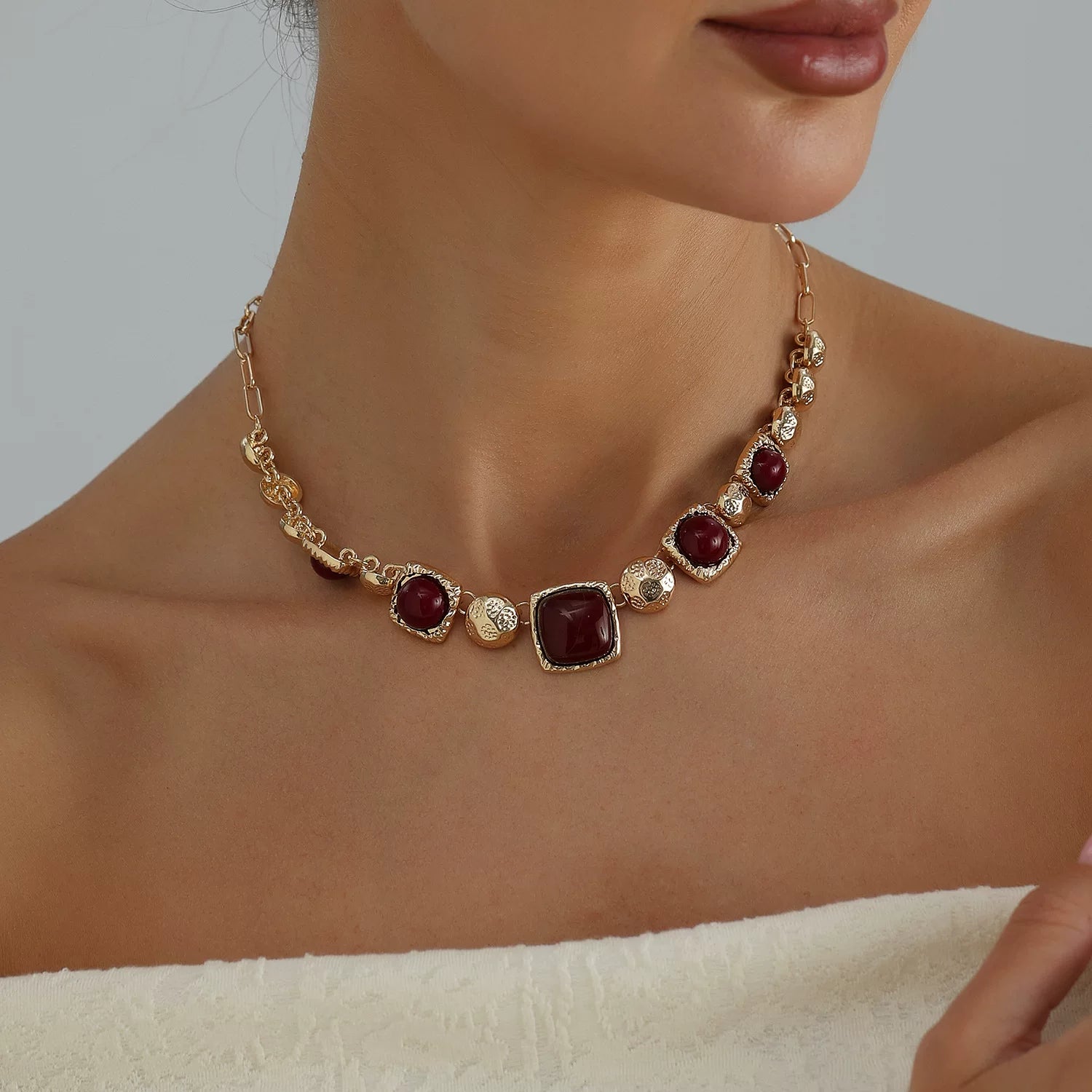 Medieval vintage dark hue bump gold metal multi element polished gold metal faceted colored gemstone geometric square panel necklace light luxury collarbone chain