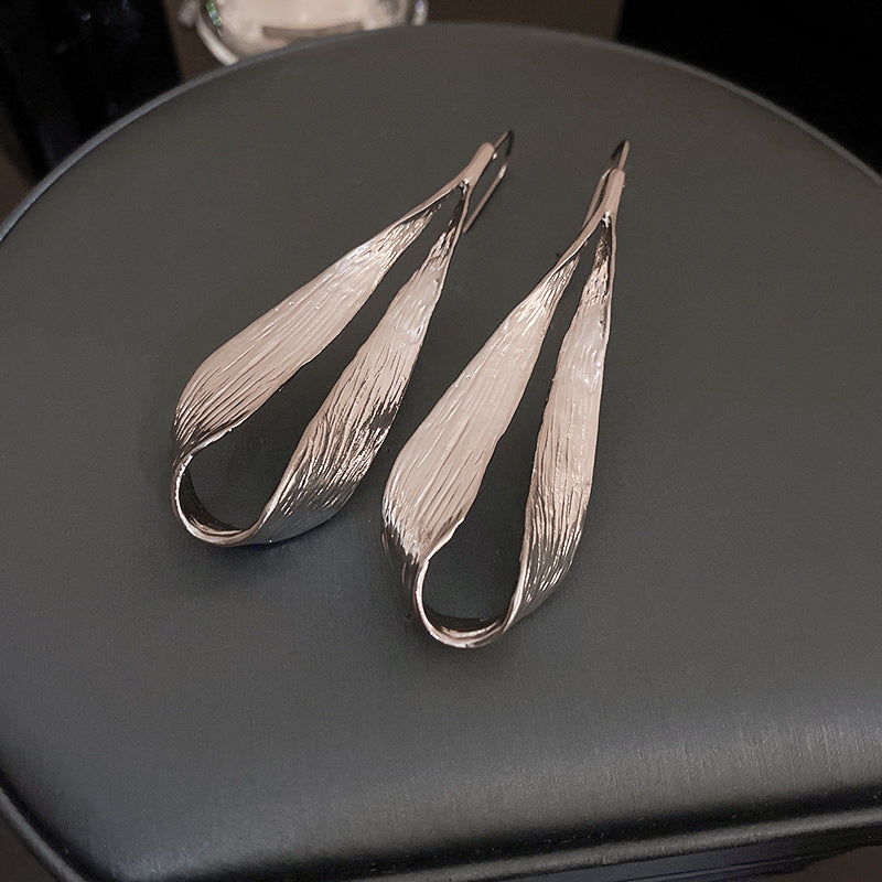 ZAMA DUMA cold metal feeling water drop leaf ear hook earrings European and American exaggerated niche temperament high sense Internet celebrity earrings women