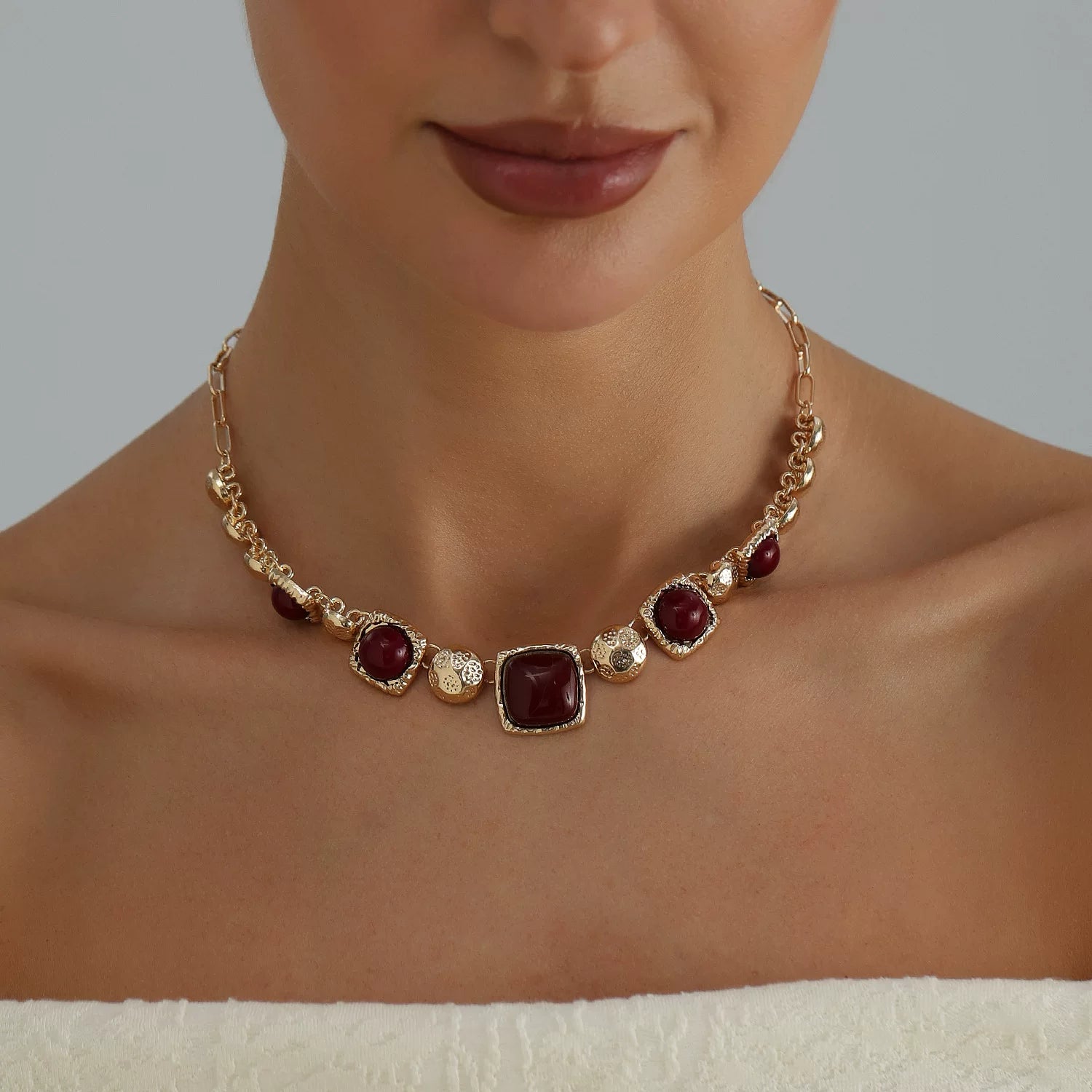 Medieval vintage dark hue bump gold metal multi element polished gold metal faceted colored gemstone geometric square panel necklace light luxury collarbone chain